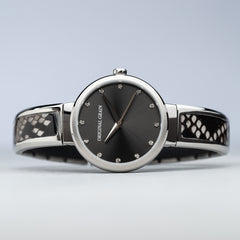 Legen Sie das Bild des Damenarmbands mit Stahl- und Schlangenmuster, 32 mm, hin