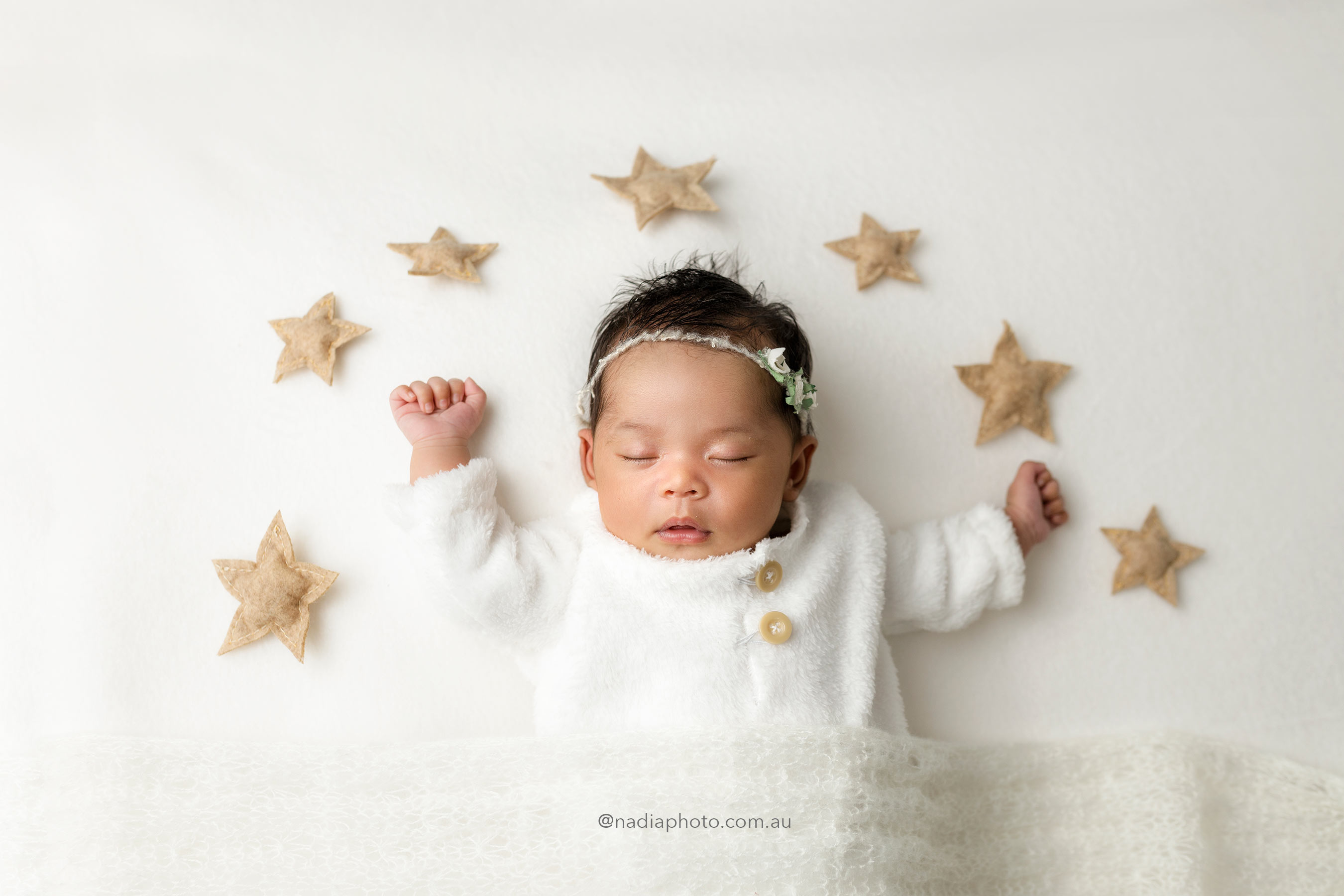 Family photoshoot with newborn baby
