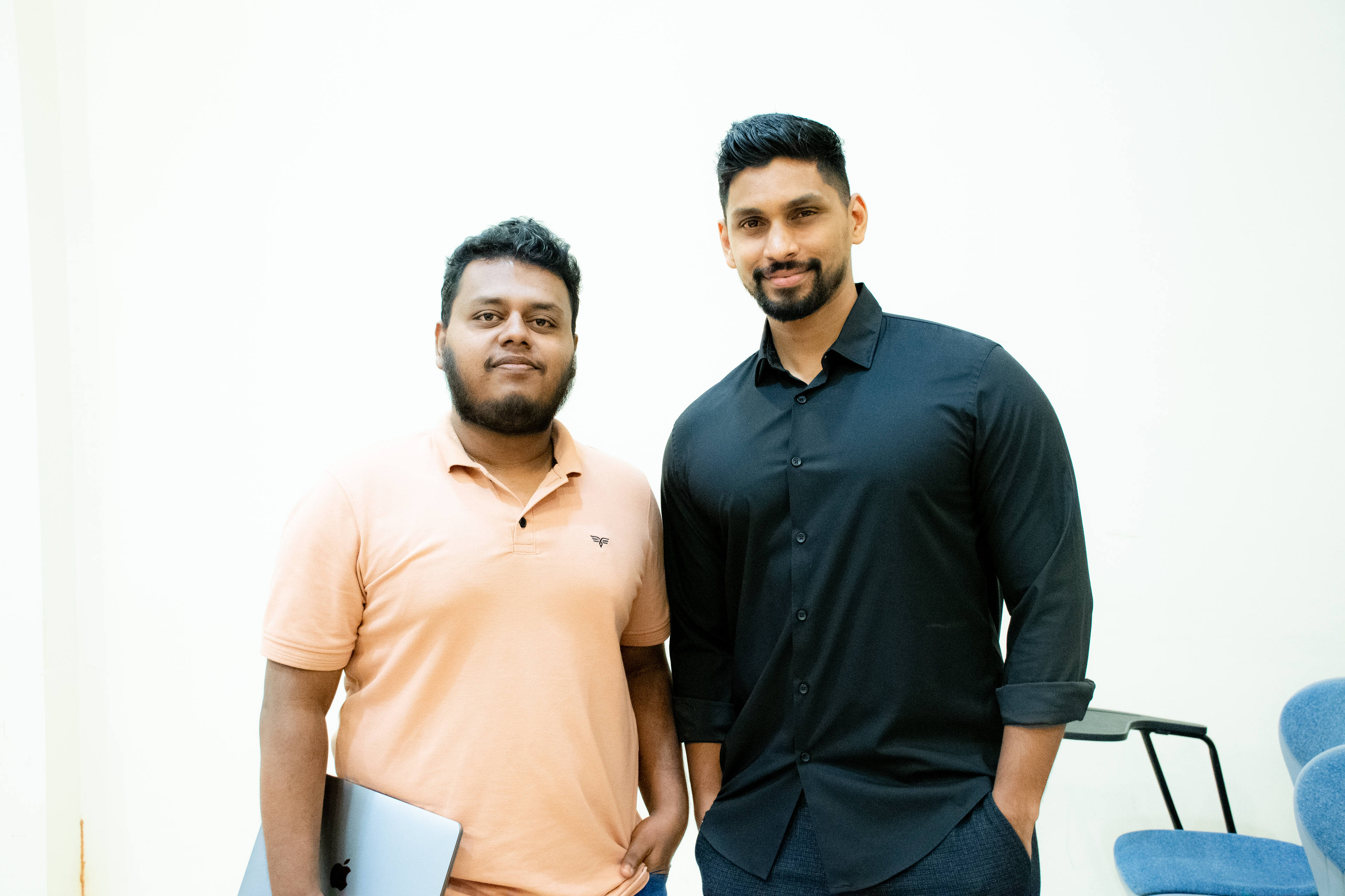 Aweesha Wijesundara standing with Joel Tillekeratne