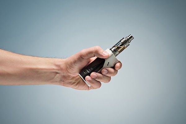 hand holding electronic cigarette