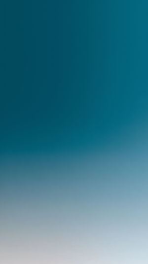 Vertical smooth gradient transitioning from deep teal at the top to light gray at the bottom