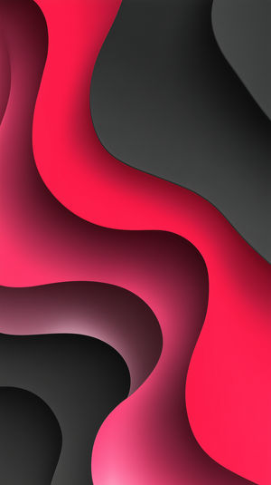 Close-up of layered abstract shapes in vibrant red and deep black, flowing like paper cut art with curves and shadows.