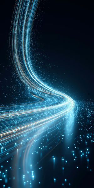 Curving neon blue and gold light trails streaking across a dark background with thousands of sparkling particle lights