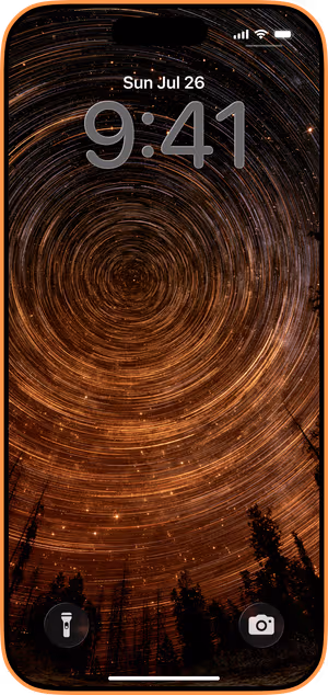 Wallpaper preview on iPhone 17 Pro Max running iOS 26 - Amber Star Trails