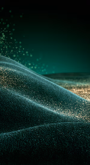 Abstract glittering dune texture on a deep emerald background in a moody minimalist aesthetic.