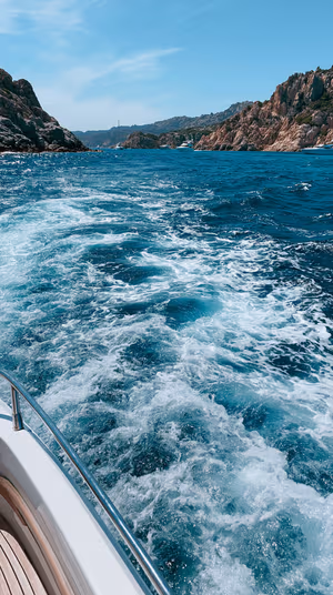 Coastal photo of foamy boat wake and turquoise sea centered on a teal background in a bright Mediterranean aesthetic, ultra hd 8K.