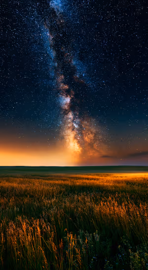 Cinematic Milky Way Prairie — iPhone lock screen wallpaper