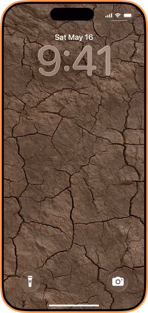 Wallpaper preview on iPhone 17 Pro Max running iOS 26 - Cracked Earth Texture