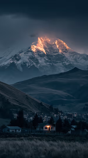 Cinematic mountain village with alpenglow peak and warm lit house on deep teal background, ultra HD 8K background.