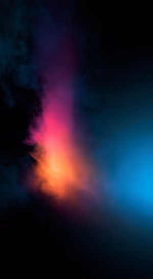 Abstract neon smoke plume with pink, orange and cyan glow on a black background Ultra HD 8K image