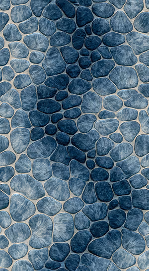Minimalist blue gray pebble texture on a dark slate background in a natural aesthetic.