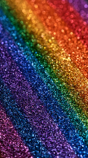 Glitter bokeh rainbow spectrum centered on a multicolor background in a dazzling sparkle aesthetic, ultra HD image.