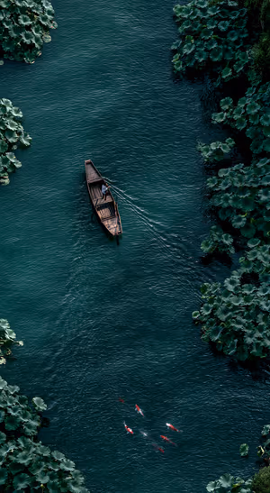 Teal River Boat — iPhone lock screen wallpaper