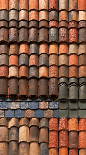 Rustic textured roof tiles mosaic in terracotta, brown and olive tones ultra HD 8K phone background.
