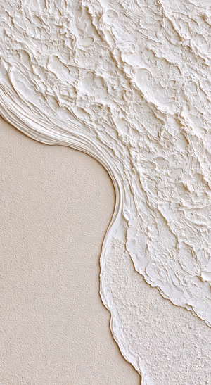 Minimalist sculptural plaster texture with layered relief on a warm ivory background in an abstract aesthetic.