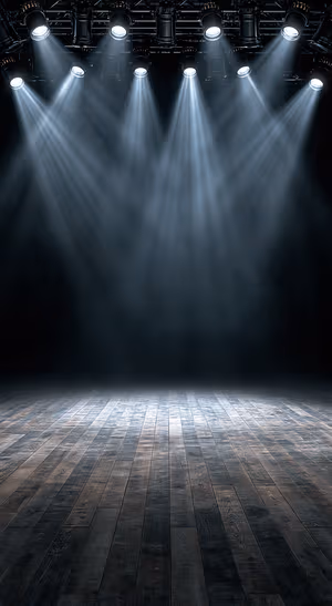 Modern stage spotlights centered on a black and gray background in a modern aesthetic.