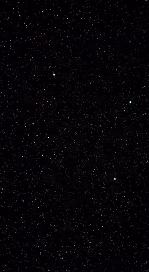 Minimalist starfield on a black background with scattered white stars in a dark aesthetic