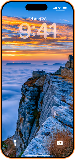 Wallpaper preview on iPhone 17 Pro Max running iOS 26 - Sunset Cliff Landscape