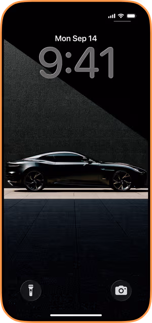 Wallpaper preview on iPhone 17 Pro Max running iOS 26 - Black Luxury Sports Car
