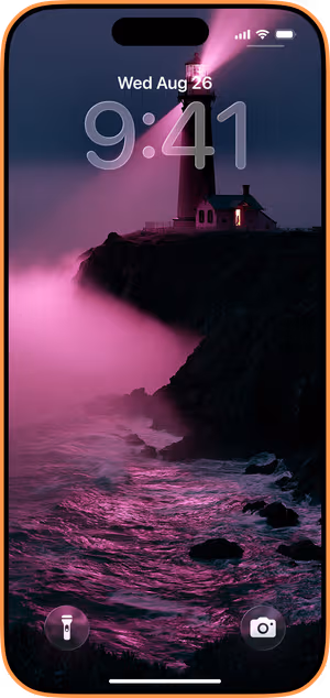 Wallpaper preview on iPhone 17 Pro Max running iOS 26 - Magenta Lighthouse Coast