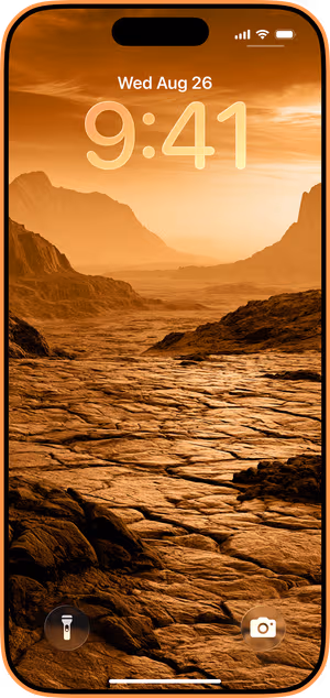 Wallpaper preview on iPhone 17 Pro Max running iOS 26 - Amber Mountain Valley