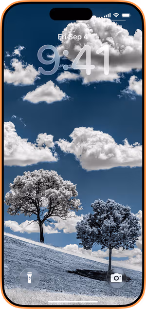 Wallpaper preview on iPhone 17 Pro Max running iOS 26 - Surreal Blue Cloud Trees