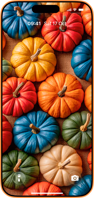 Wallpaper preview on iPhone 17 Pro Max running iOS 26 - Colorful Fall Pumpkins