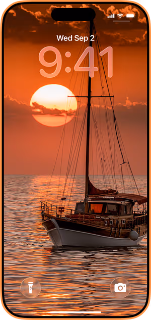 Wallpaper preview on iPhone 17 Pro Max running iOS 26 - Orange Sunset Sailboat