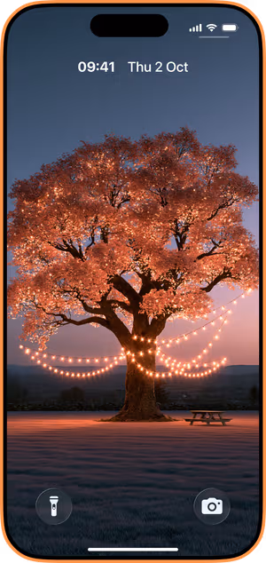 Wallpaper preview on iPhone 17 Pro Max running iOS 26 - Autumn Tree Amber Glow