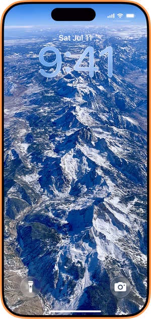 Wallpaper preview on iPhone 17 Pro Max running iOS 26 - Aerial Snow Ridge