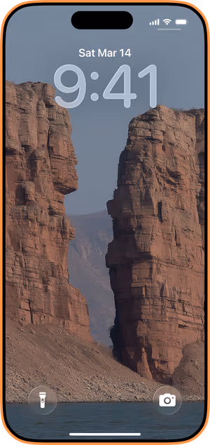 Wallpaper preview on iPhone 17 Pro Max running iOS 26 - Desert Canyon Divide