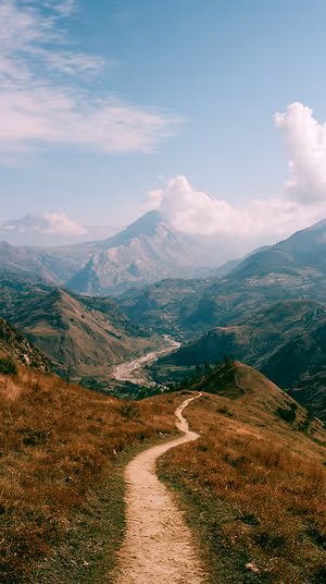 Cinematic mountain path centered on a teal sky with warm earth tones in a cinematic aesthetic, ultra hd 8K background for iPhone