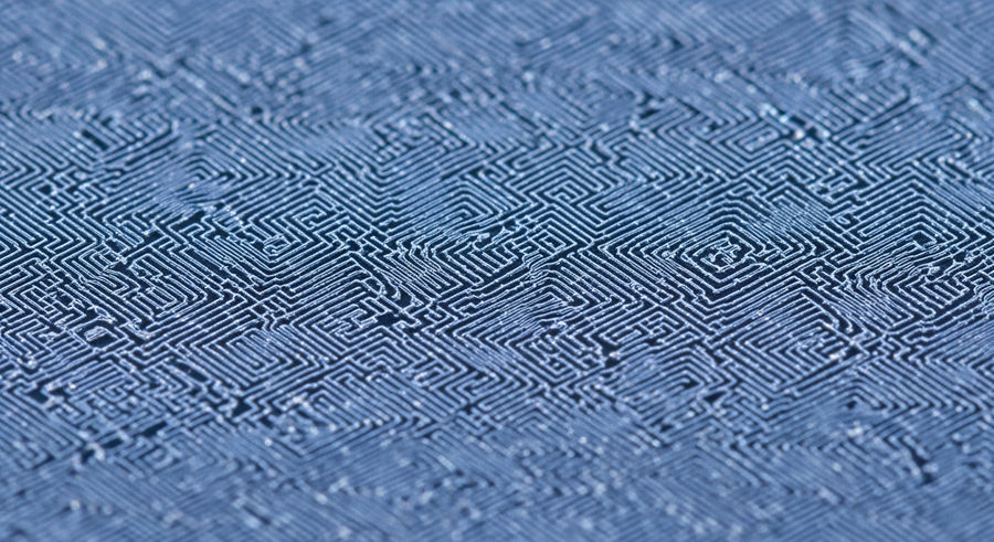 nanostructured surface of photonic chip with intricate patterns
