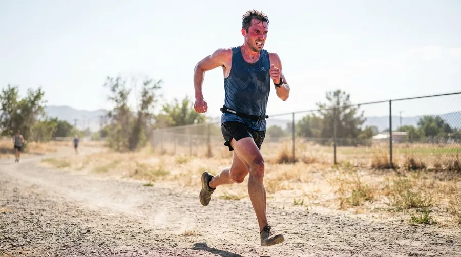Runner practicing heat acclimation exercises in hot weather