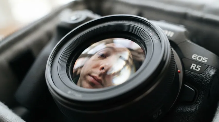 Close-up of camera lens curvature illustrating physics of lens distortion