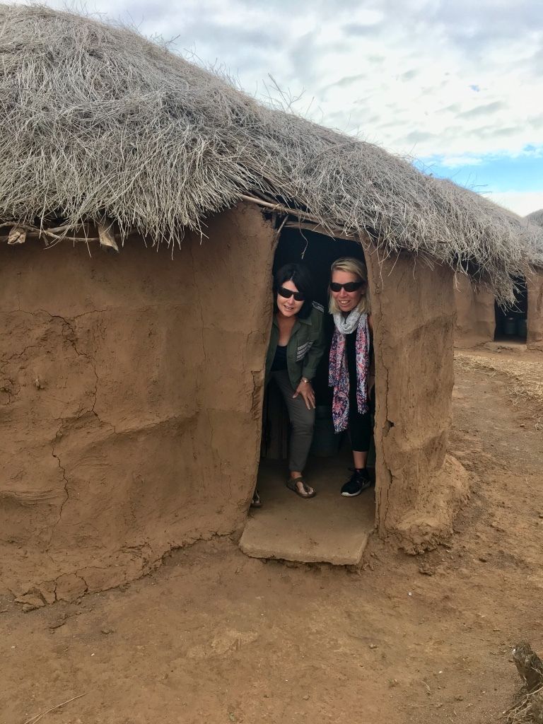 Bomas (dung huts) of the Maasai Tribes in Tanzania with Carine and Linda, travel experts