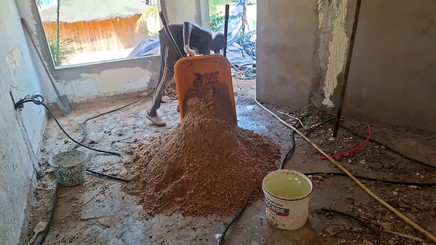 Reprise des sols d'une chambre pendant le chantier