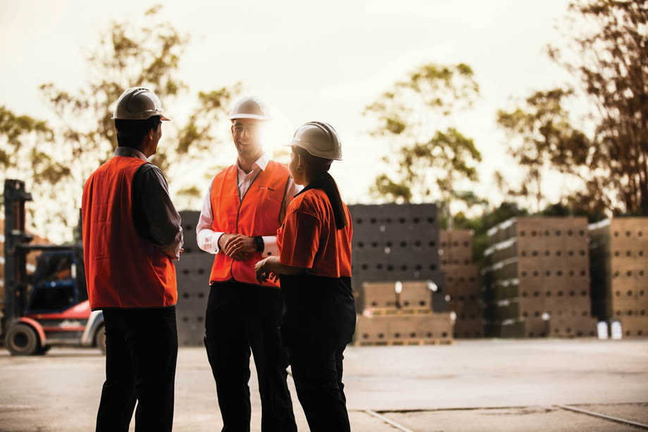 Brickwork workers in yard