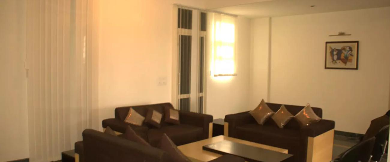 Living Room Ansal API Fairway Apartment