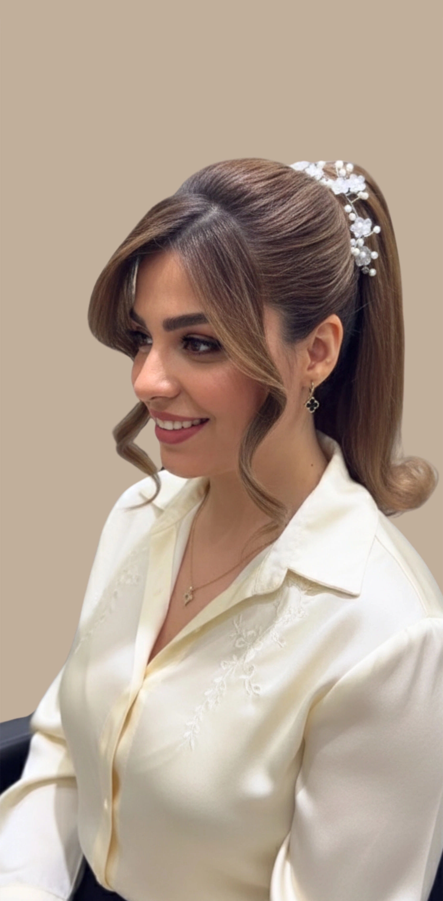 Side profile of woman with styled hair