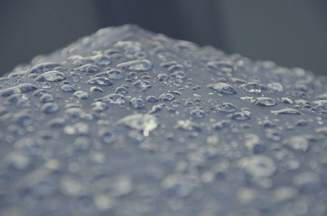 Rain beading on a waterproofed tent