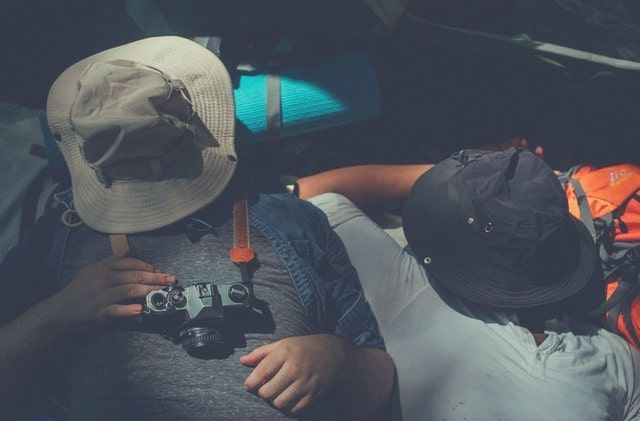 2 people sleeping in tent