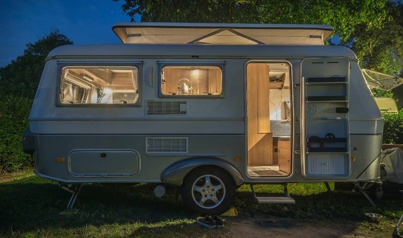 Caravan with door and poptop open