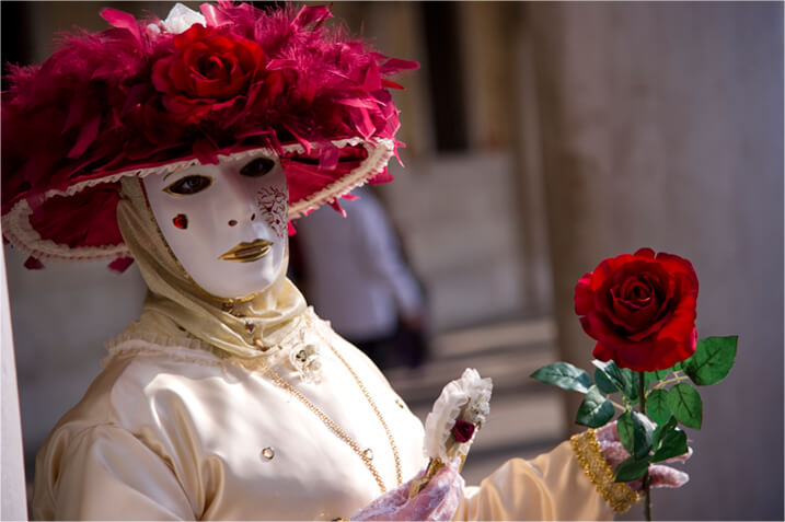 Woman wearing a venetian mask, taken with Nikon 24-120mm f/4G