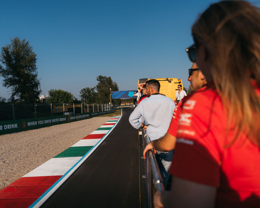 F1 Experiences-guests on the back of a truck during the Track Tour