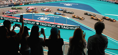 Fans on the balcony of one of the hospitality venues at the Miami GP