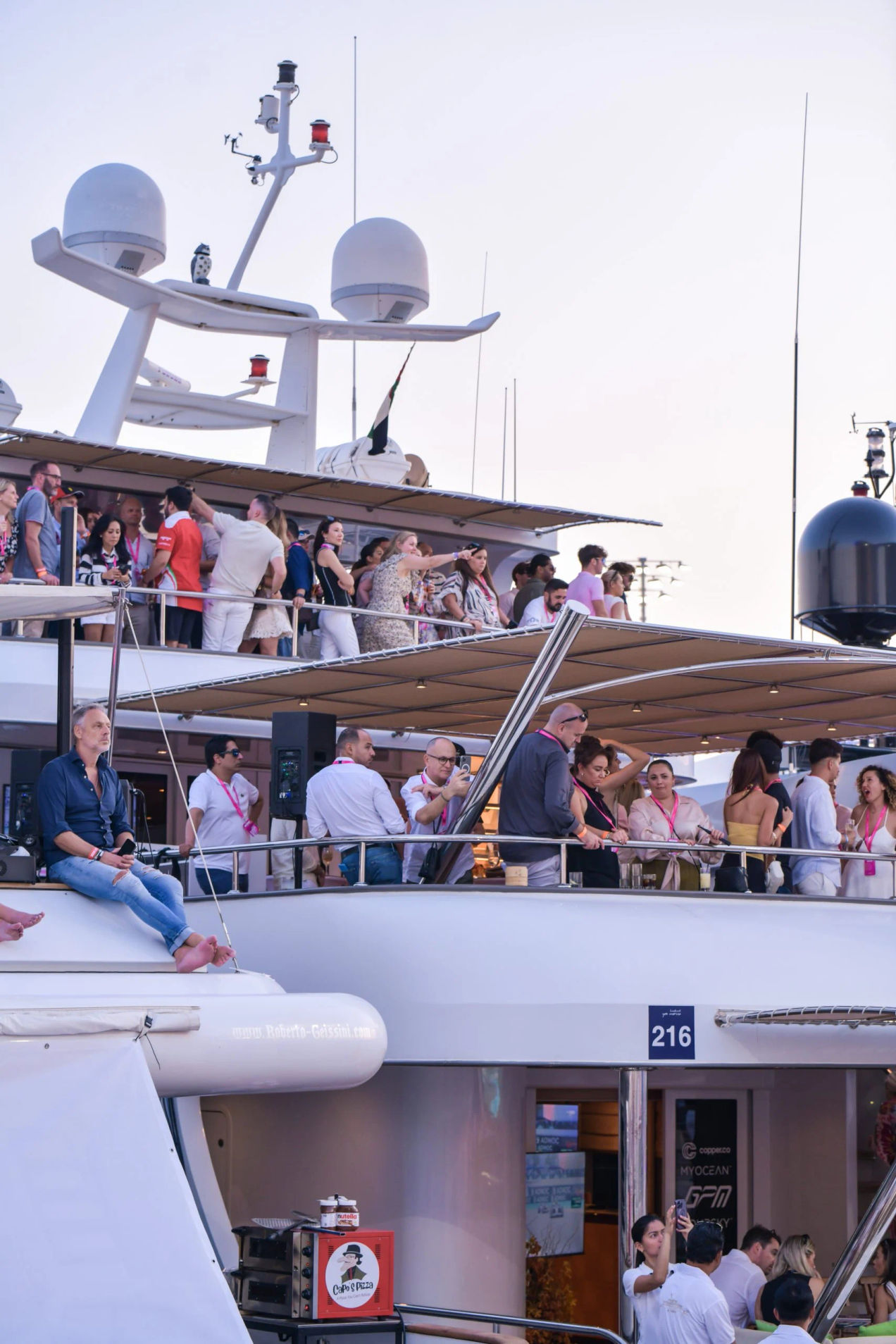 Guests enjoying the view from the yacht in the Marina at the Abu Dhabi GP