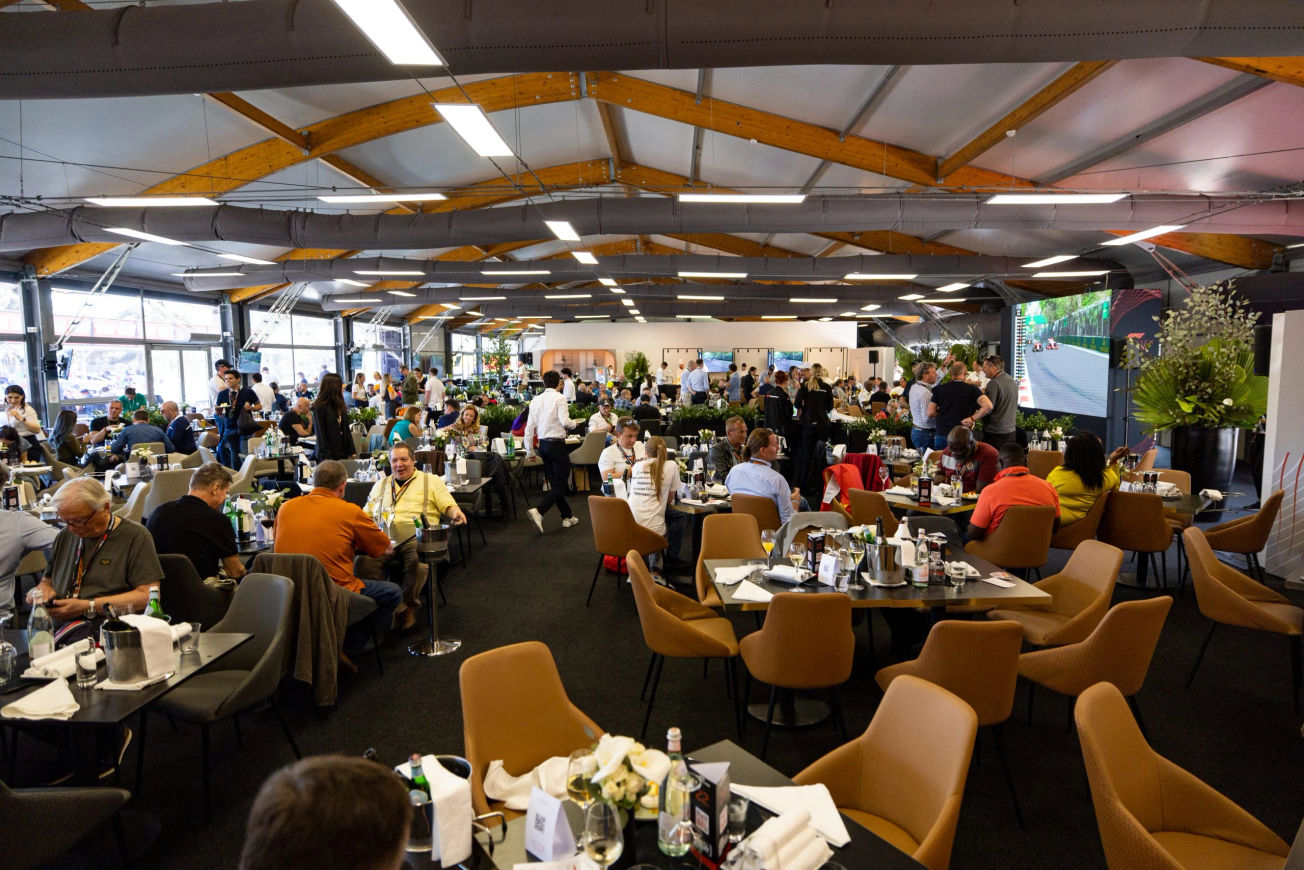 Guests eating and following the race in the Paddock Club at the Azerbaijan GP