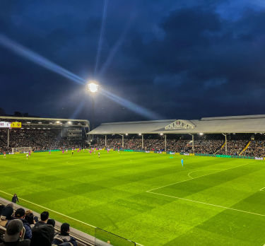 Craven Cottage during a Fulham match at night