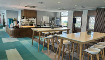 The inside seating area of the North Yas Premium Suite